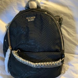 Brand new in package. Backpack/purse